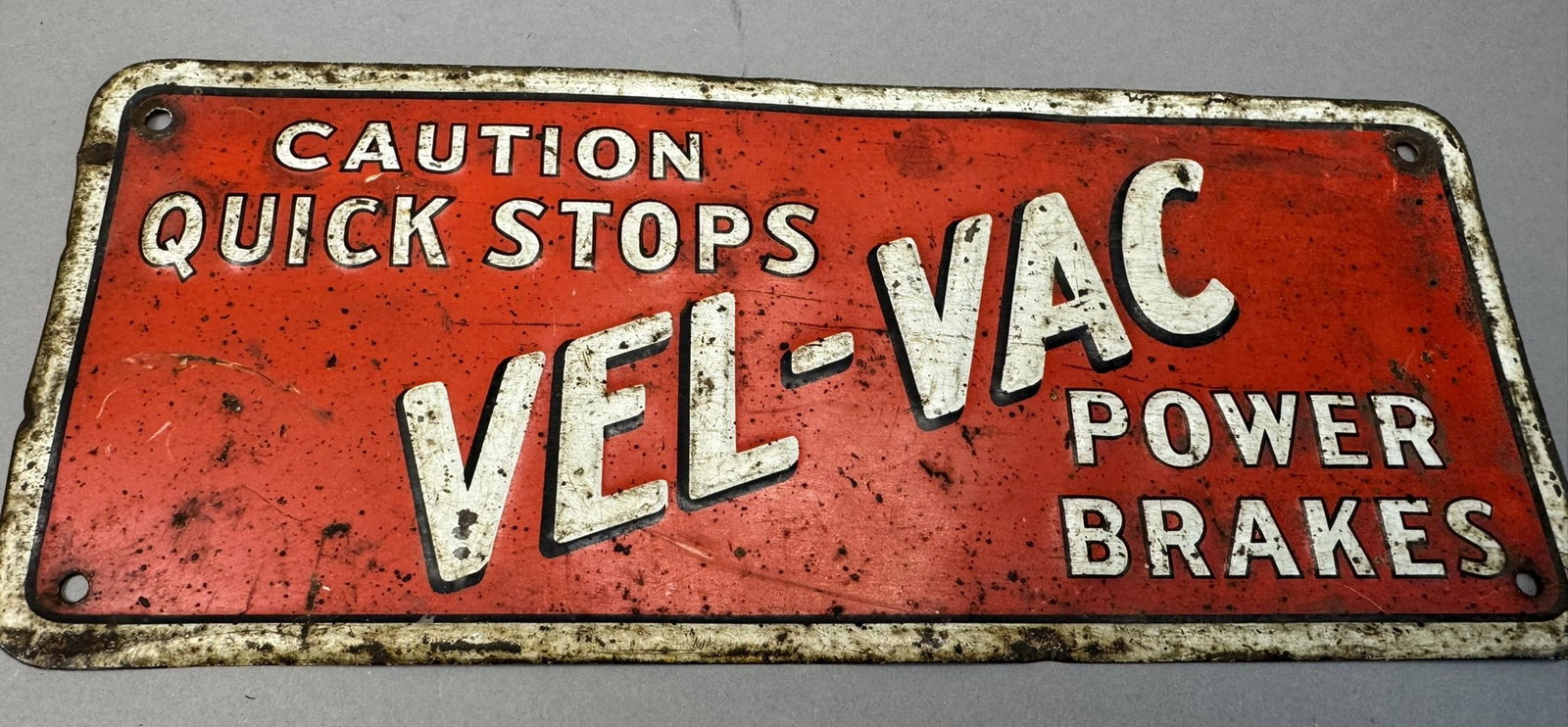 Vel-Vac Power Brakes Embossed Advertising Sign: Great 50s embossed advertising sign.