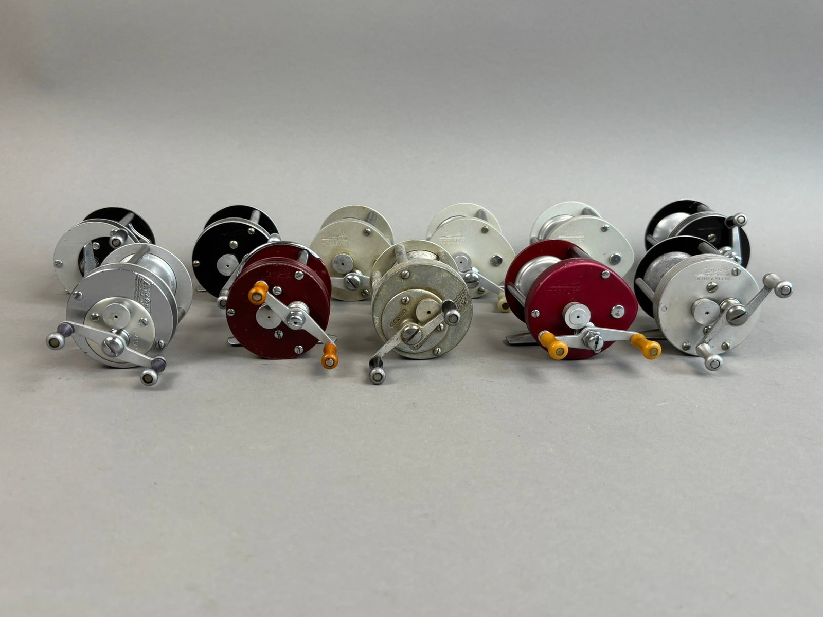 11 40s 50s Langley Bait Casting Fishing Reels: Great original assorted lot of reels. See all photos.