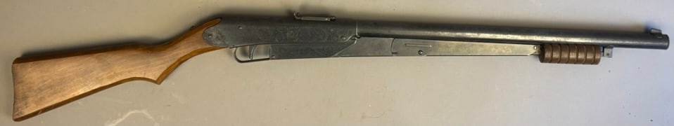 Vintage Daisy 25 Straight Stock BB Air Pump Rifle: This lot features a nice vintage Daisy 25 straight stock bb rifle. Great engraving in trigger area. Please see all pictures. Measurements are 36.5"x4.25"x1.25".