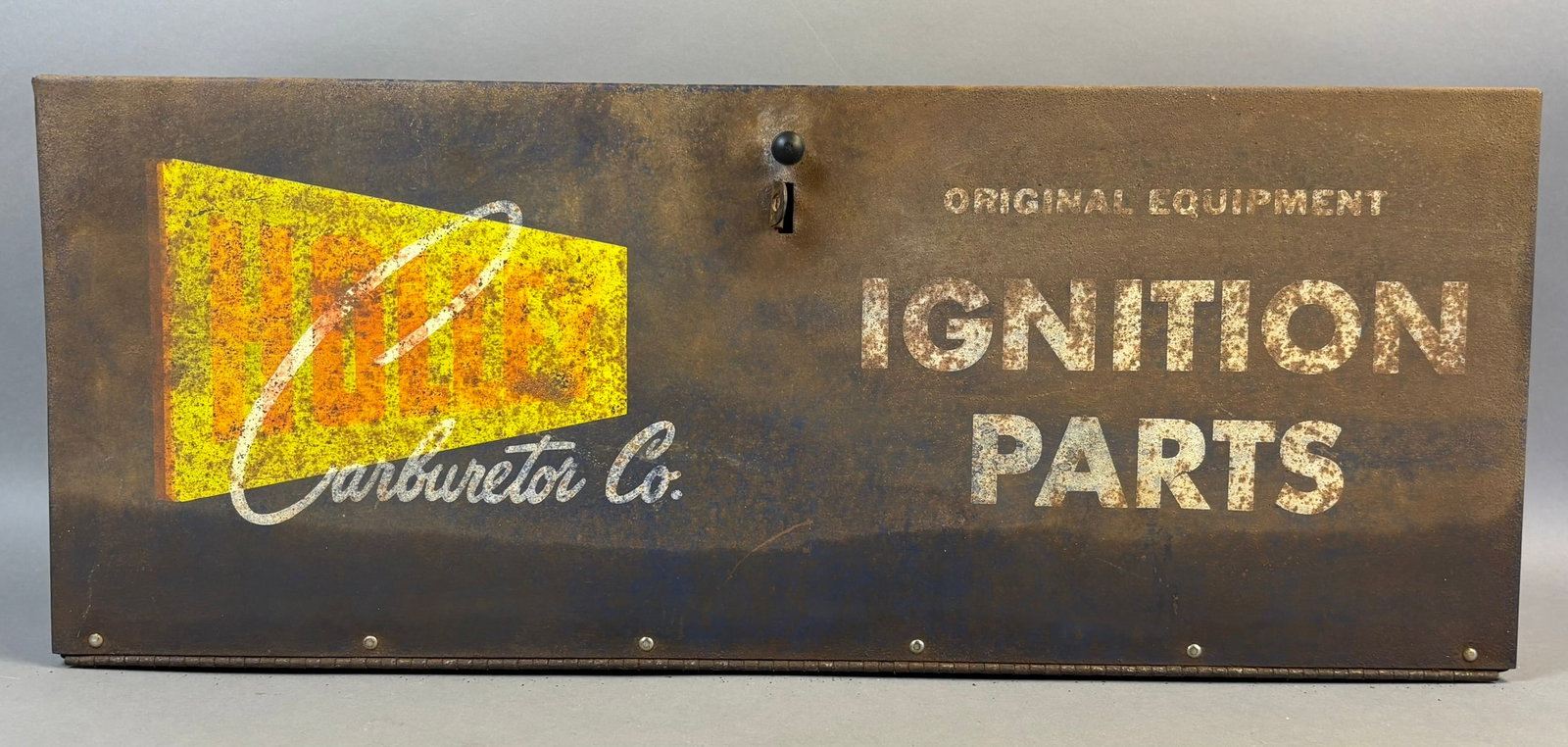 50s Holley Carburetor Ignition Parts Store Cabinet: Nice original Holley Carburetor Store Ignition Parts Cabinet, some surface rust and paint loss overall. Please review pictures. Overall measurements are 24.25"x7.25"x9.75".