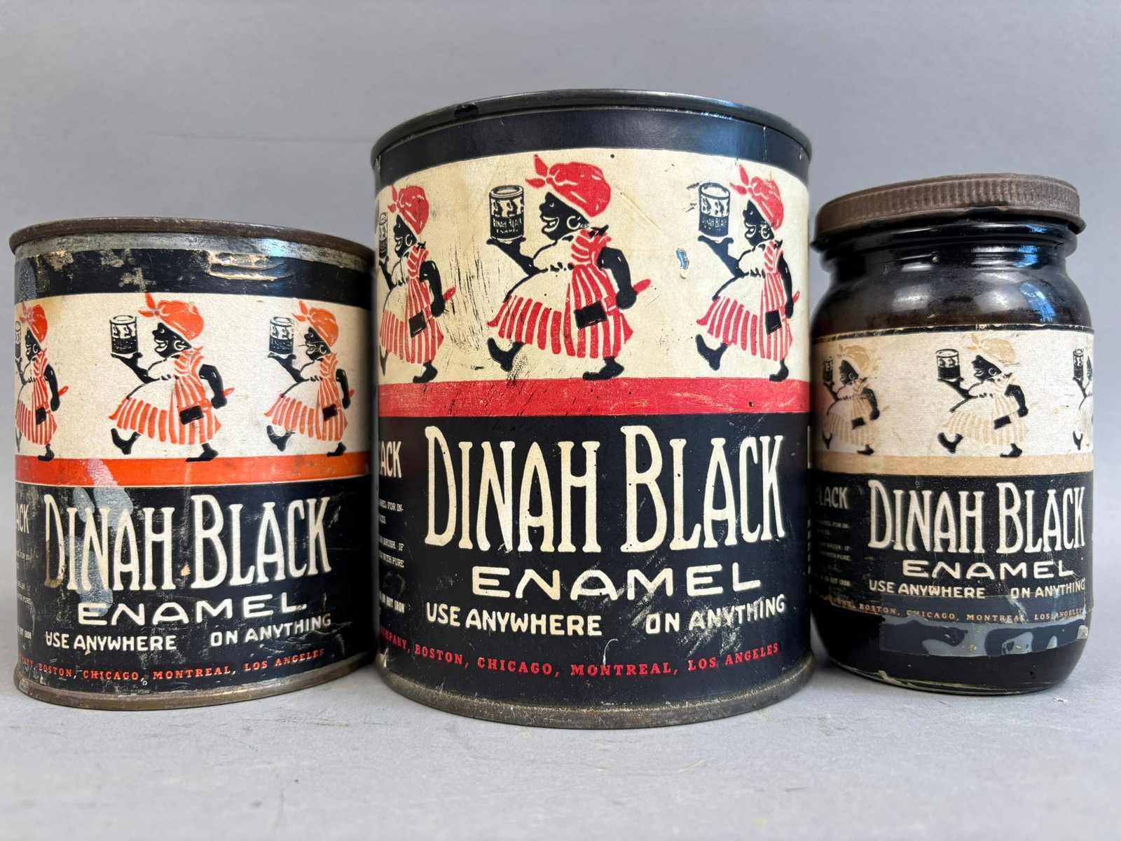 3 Antique Dinah Black Enamel Paint Cans Jars: This lot contains a trio of antique Dinah Black Enamel Paint cans, one is a glass jar and other 2 are metal cans. All feature a paper label with some wear and loss. Please review pictures.