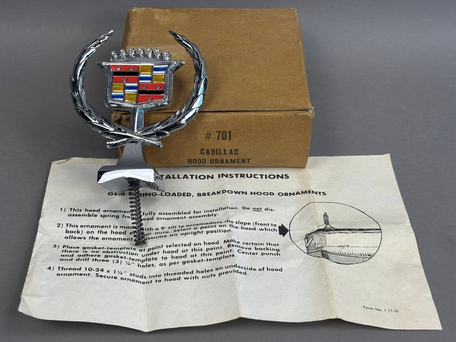 NOS 70s Era Cadillac Hood Ornament w/Box Papers: This lot features a NOS Cadillac Hood ornament in original packaging, that was never installed. Please review all pictures for best description.