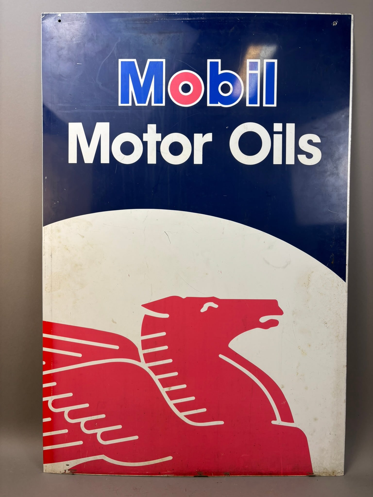 Vintage DST Mobil Gas Motor Oils Pegasus Sign: This lot features a vintage Mobil Motor oils double sided hanging sign. Overall measurements are 24"x36".