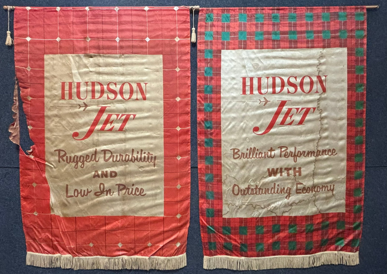 2 Hudson Jet Dealer Showroom Advertising Banner: This lot features a pair of Hudson Jet dealer showroom advertising banners. One has staining and one has a rip in the fabric, please review all pictures for best description. Overall measurements are 