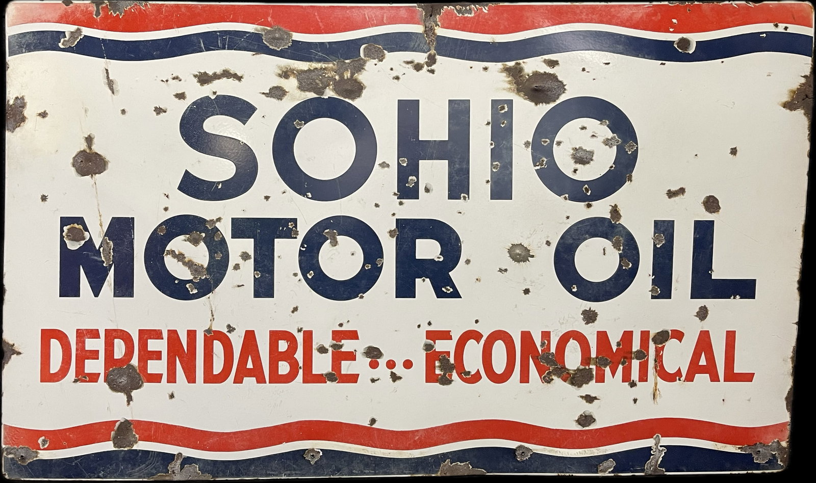 Sohio Motor Oil Gas Station SSP Advertising Sign: This lot features an original single sided porcelain with rolled edge Sohio Motor Oil gas station advertising sign. This one has loss, chips, wear, please review all pictures for best description. Ove