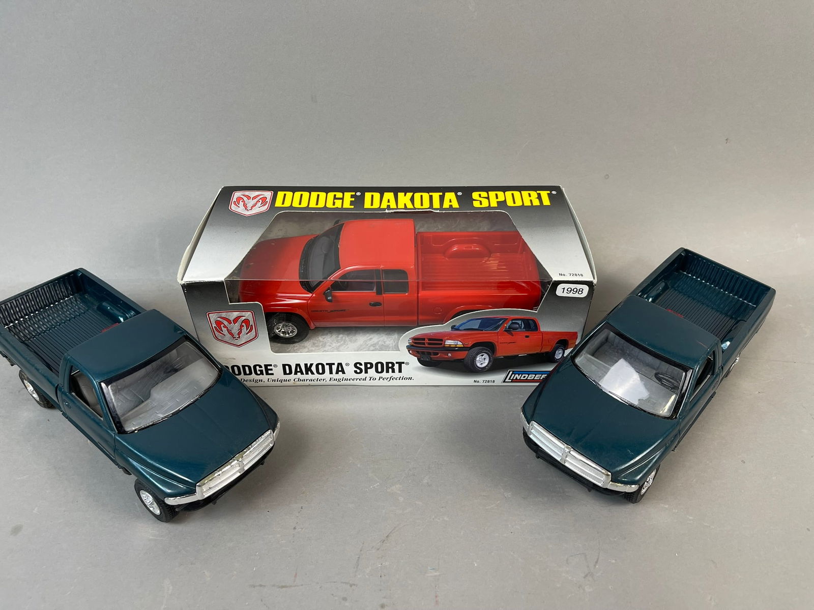 3 Lindberg Dodge Dakota Ram Truck Die Cast Toys: This lot features 3 various Dodge Ram or Dakota trucks. 1-Lindbery NOS Dakota, 2- 2 plastic Dodge Ram 2500 Toy Trucks. The plastic toys will need some glue, and some may not be completely built models