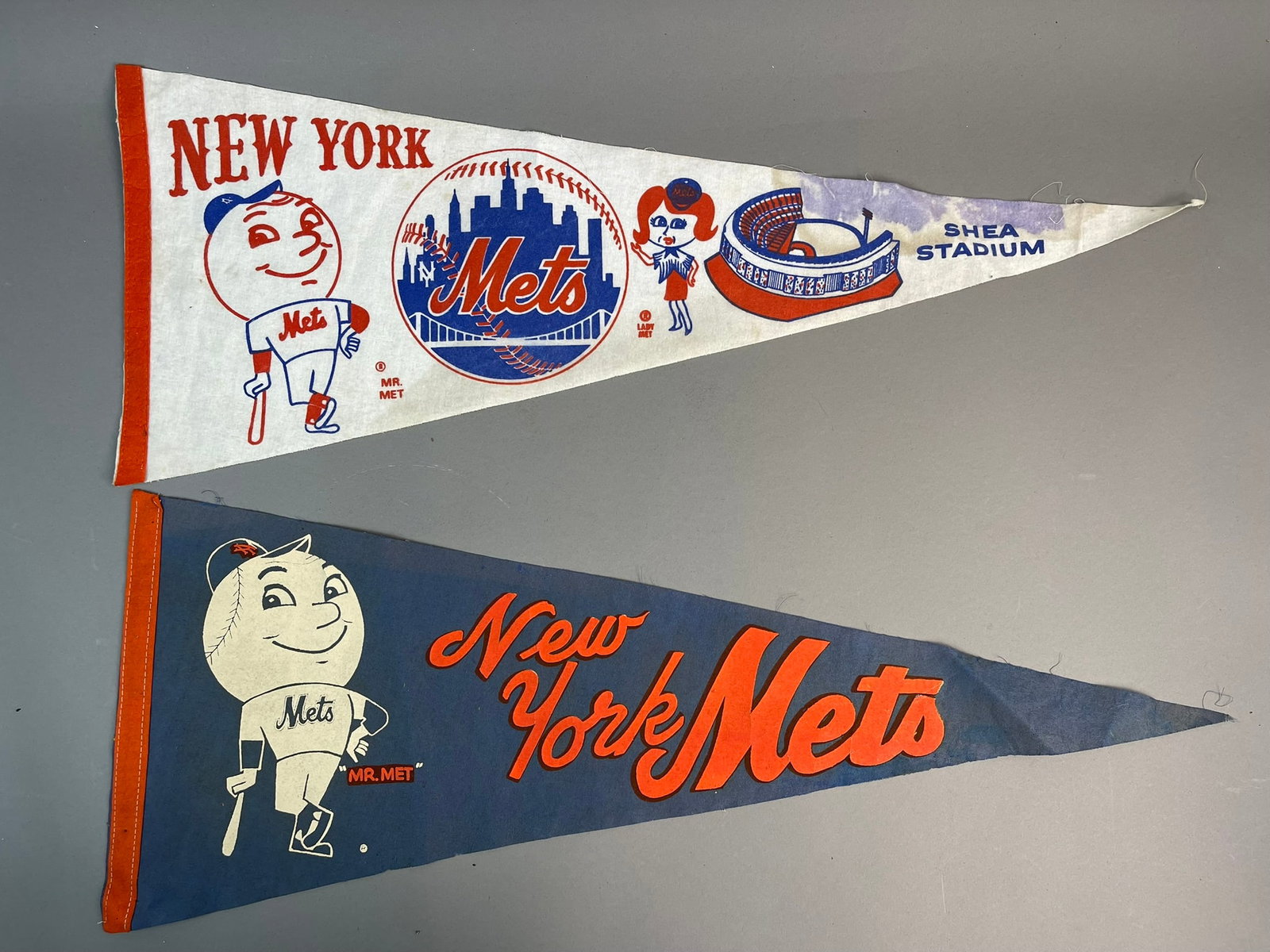 Pair 1960s New York Mets Shea Stadium & Mr Met Baseball Felt Pennants: Great original pair of New York Mets pennants. Light wear as shown. Full size 30" pennants.