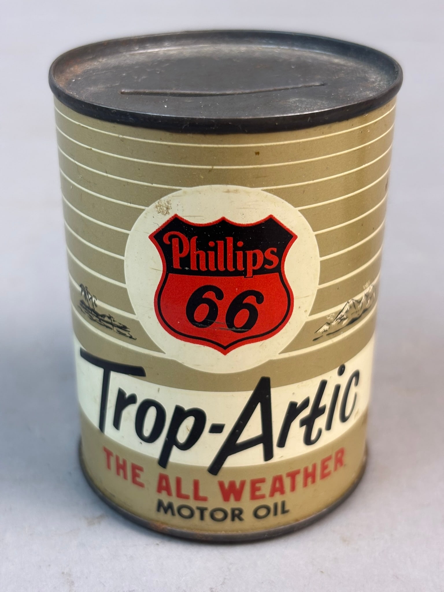 Trop Artic Phillips 66 Original 4oz Metal Coin Bank: See all photos for a better idea on condition. All items are sold as-is, where-is! This is a simulcast auction event, with in house bidding offered, along with multiple online bidding platforms. If yo