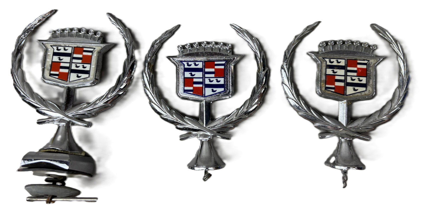 Lot 3 Cadillac Original 70s 80s OEM Hood Ornament Wreath Crest: See all photos for a better idea on condition. All items are sold as-is, where-is! This is a simulcast auction event, with in house bidding offered, along with multiple online bidding platforms. If yo