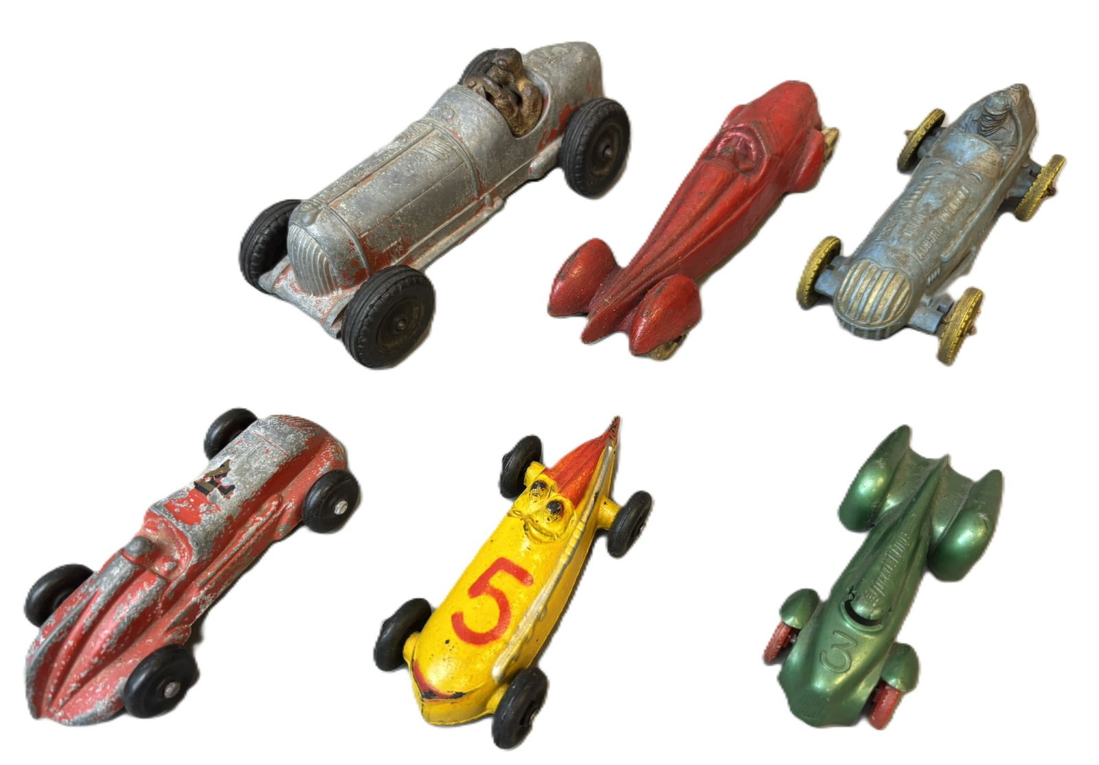 Lot 6 Original 30s-40s Cast Aluminum Plastic Rubber Race Cars: See all photos for a better idea on condition. All items are sold as-is, where-is! This is a simulcast auction event, with in house bidding offered, along with multiple online bidding platforms. If yo