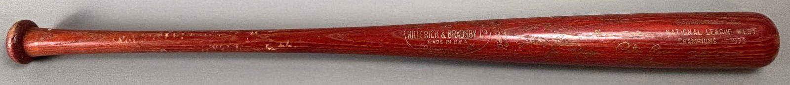 1973 Cincinnati Reds National League West Champions Baseball Bat: Wonderful original 1973 Cincinnati Reds Natioinal League West Champions. Measures 34.5" PLEASE NOTE WE OFFER IN HOUSE SHIPPING & HAVE BIDDING AVAILABLE ON OUR OWN WEBSITE! If you win on LIVE AUCTIONEE