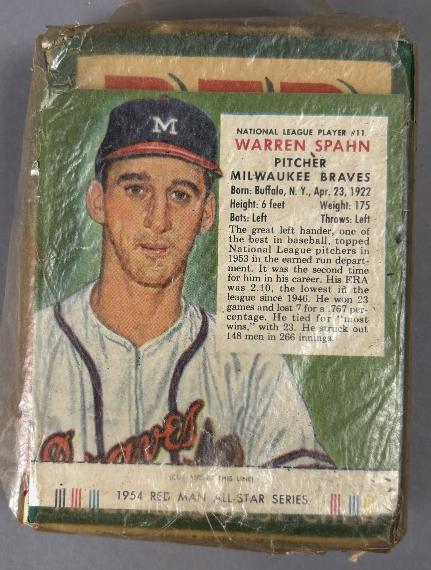 1954 Red Man Sealed Tobacco Pack w/ Warren Spahn Baseball Card: Remarkable time capsule. Original sealed 1954 Red Man Tobacco Pack w/ Warren Spahn card as shown. Pack shows some wear. Extremely high grade Spahn. PLEASE NOTE WE OFFER IN HOUSE SHIPPING & HAVE BIDDIN