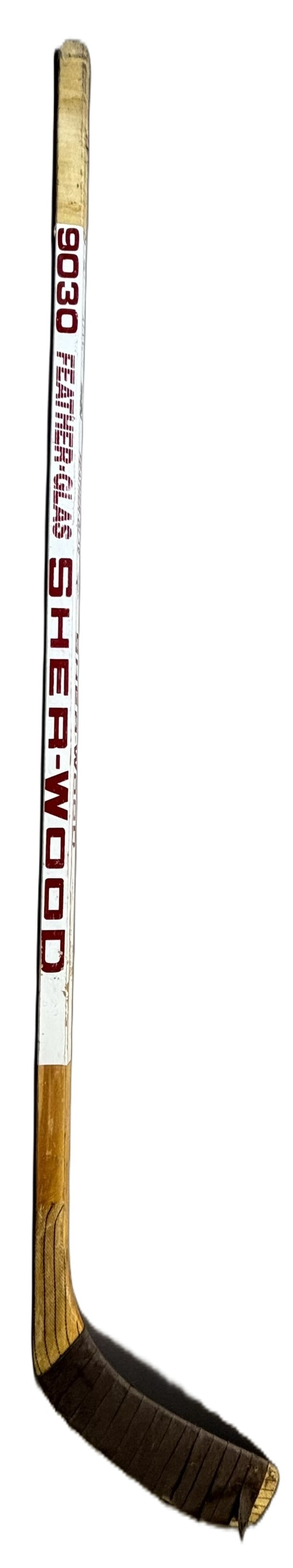 Sheldon Kennedy Game Used & Signed Sher-Wood 9030 Stick: Offered here is an authentic game-used and signed Sher-Wood 9030 “Feather-Glas” hockey stick attributed to longtime NHL forward Sheldon Kennedy. This classic Sher-Wood model features bold