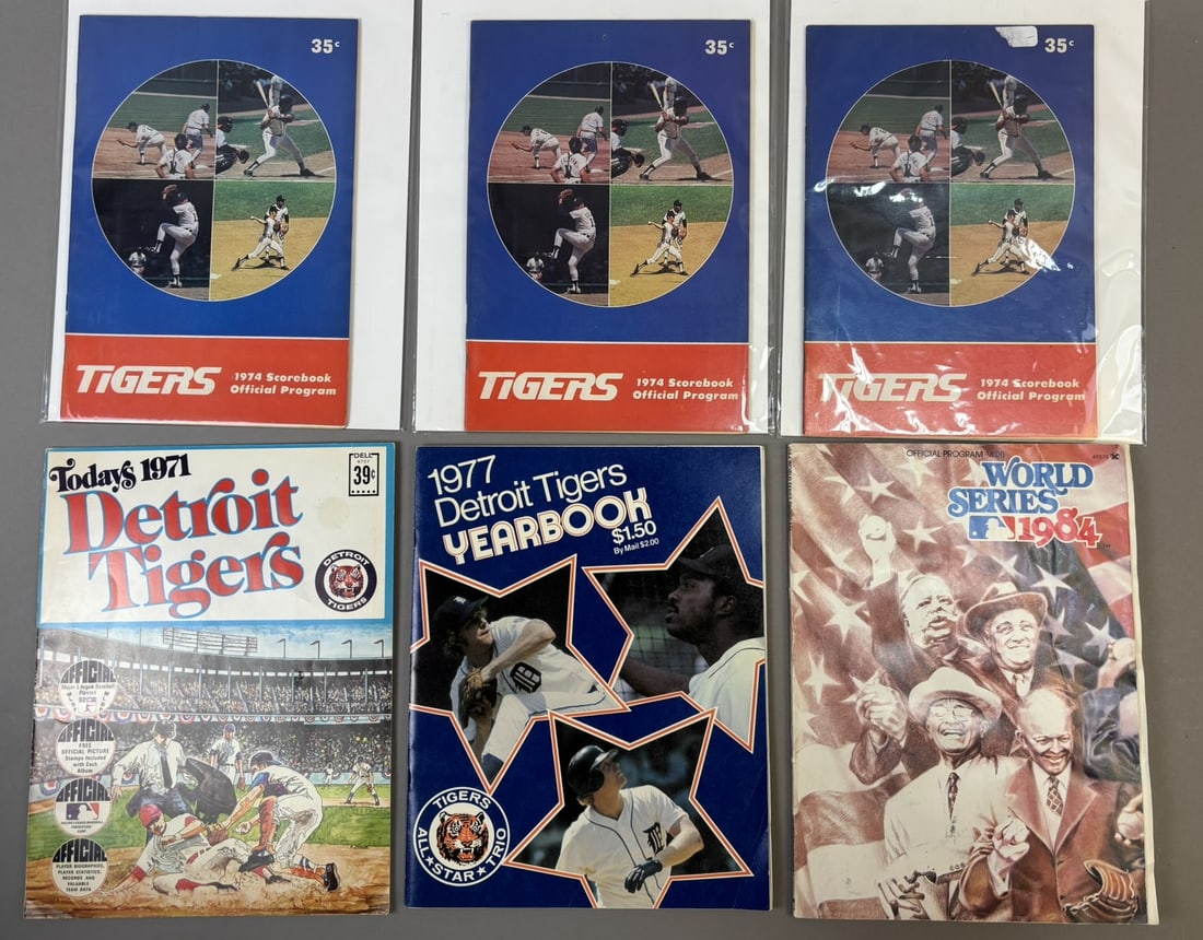 Lot 6 Detroit Tigers 1974 Scorebooks 1971 1977 Yearbooks & 1984 World Series Program: Great original assorted lot of scorebooks, yearbooks and programs. PLEASE NOTE WE OFFER IN HOUSE SHIPPING & HAVE BIDDING AVAILABLE ON OUR OWN WEBSITE! If you win on LIVE AUCTIONEERS, please click "SEL