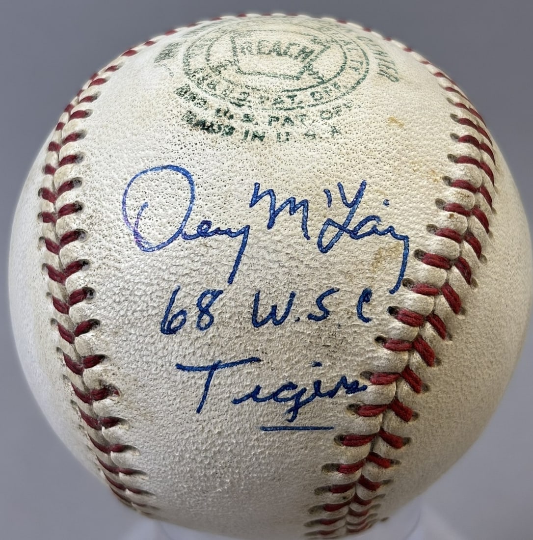 Denny McLain Single Signed 1968 World Series Champion Reach Cronin Baseball: Great original 60s era signed baseball with a strong McLain signature and inscription. PLEASE NOTE WE OFFER IN HOUSE SHIPPING & HAVE BIDDING AVAILABLE ON OUR OWN WEBSITE! If you win on LIVE AUCTIONEER