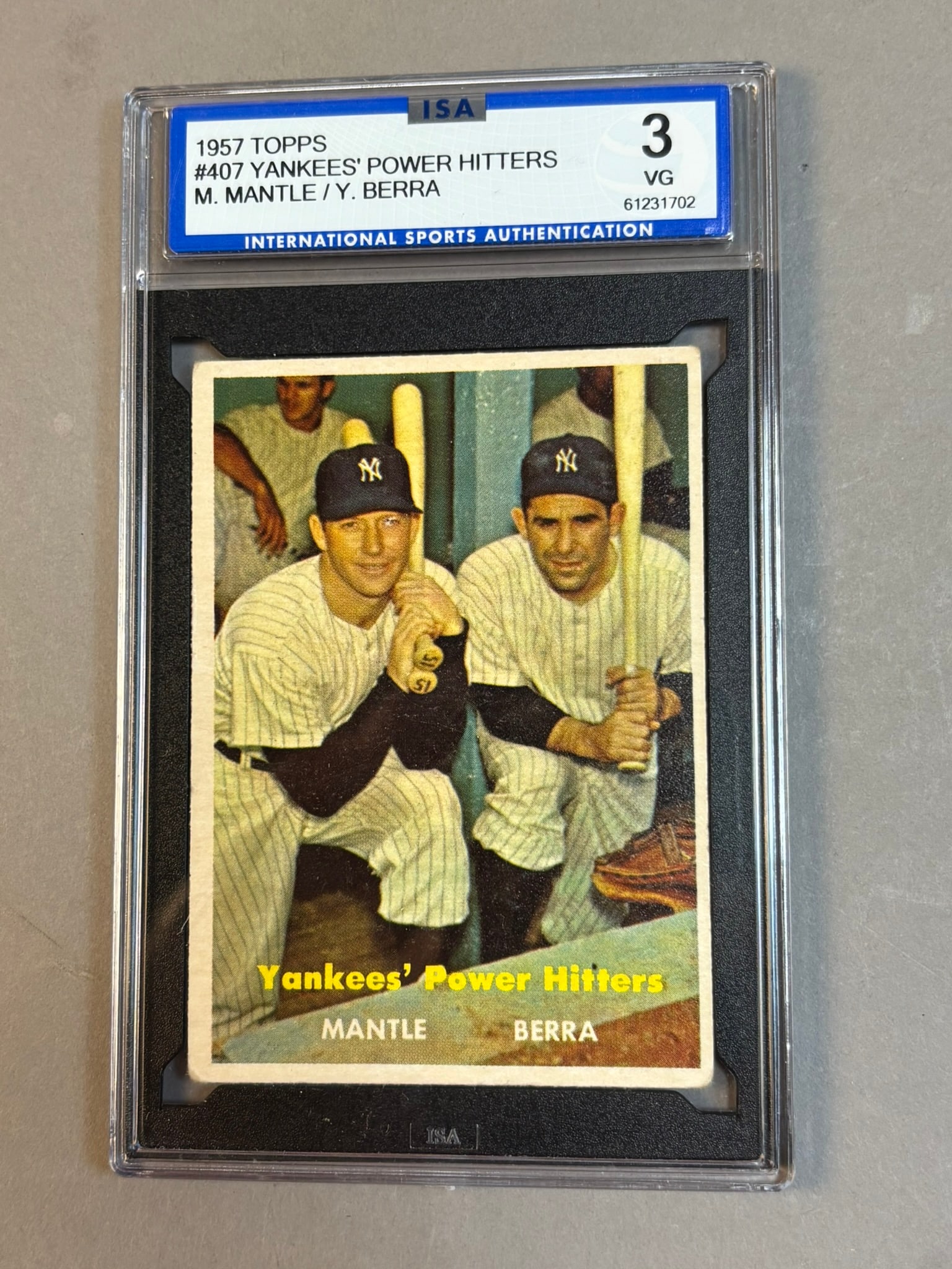 1957 Topps #407 Mickey Mantle Berra Power Hitters HOF ISA 3 VG Very Good: ISA 3.5 Cert 61231702 PLEASE NOTE WE OFFER IN HOUSE SHIPPING & HAVE BIDDING AVAILABLE ON OUR OWN WEBSITE! If you win on LIVE AUCTIONEERS, please click "SELF ARRANGED SHIPPING" when you receive your in
