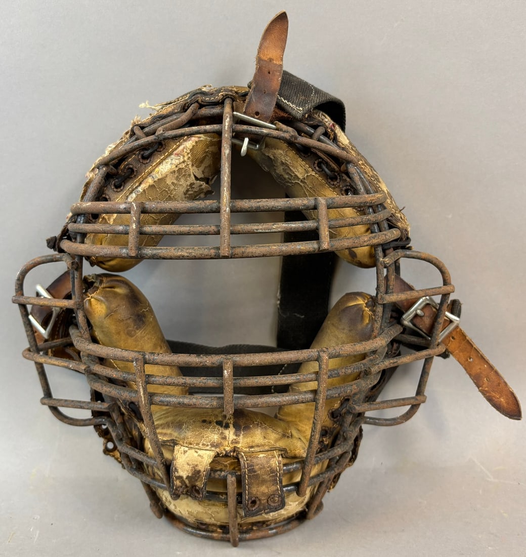 1950s Nokona Open Vision Triple Bar Leather Baseball Catchers Mask: Great orgiinal welded mask. A few loose laces. PLEASE NOTE WE OFFER IN HOUSE SHIPPING & HAVE BIDDING AVAILABLE ON OUR OWN WEBSITE! If you win on LIVE AUCTIONEERS, please click "SELF ARRANGED