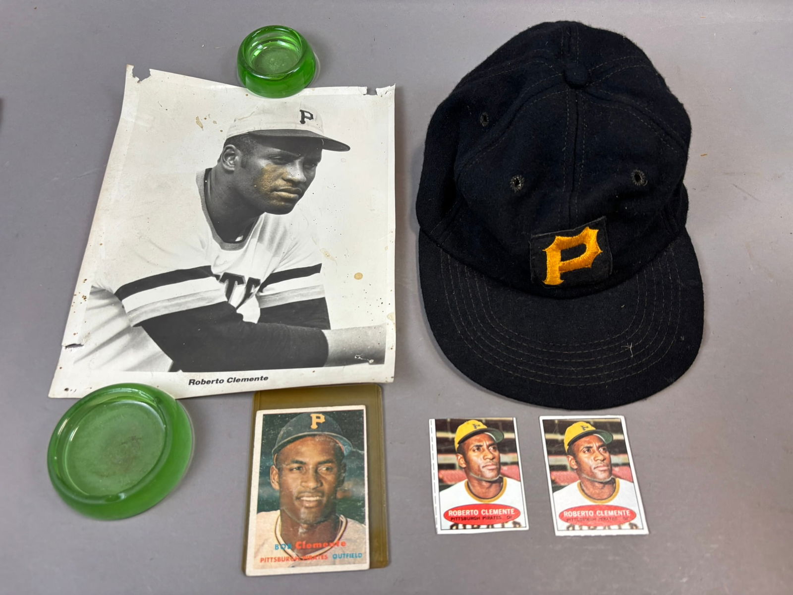 Lot 5 Pittsburgh Pirates Roberto Clemente 1957 Topps 8x10 Photo & Team Hat: Great original Clemente lot. See all photos. PLEASE NOTE WE OFFER IN HOUSE SHIPPING & HAVE BIDDING AVAILABLE ON OUR OWN WEBSITE! If you win on LIVE AUCTIONEERS, please click "SELF ARRANGED SHIPPING" w