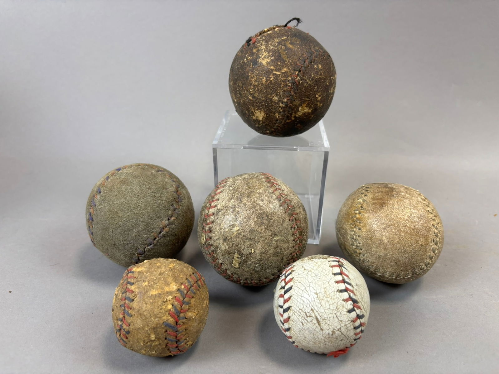 Antique Lot 6 Early 1900s-20s Red Blue Lace Baseballs & Indoor Diminuitive Balls: Great original assorted lot of early baseballs in various conditons. Lots of patina and use. PLEASE NOTE WE OFFER IN HOUSE SHIPPING & HAVE BIDDING AVAILABLE ON OUR OWN WEBSITE! If you win on LIVE