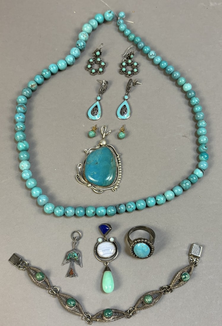 Sterling Turquoise Jewelry Lot Necklace Earrings Ring Pendants 24.42g: Assorted sterling silver turquoise jewelry group including a strand of round turquoise beads, large turquoise cabochon pendant marked H. Tsosie, turquoise cluster dangle earrings, turquoise inlay drop