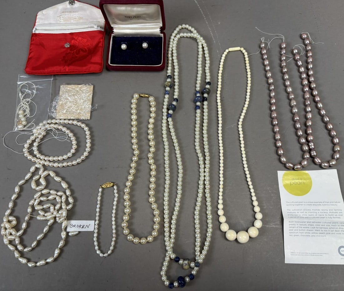 Large Lot Cultured Pearl Necklaces Bracelet Earrings Mixed Colors w Boxes: Group lot of cultured pearl jewelry including multiple pearl necklaces in varying sizes and colors comprising classic white pearl strands, pink/lavender cultured pearl strands, a multi-strand pearl