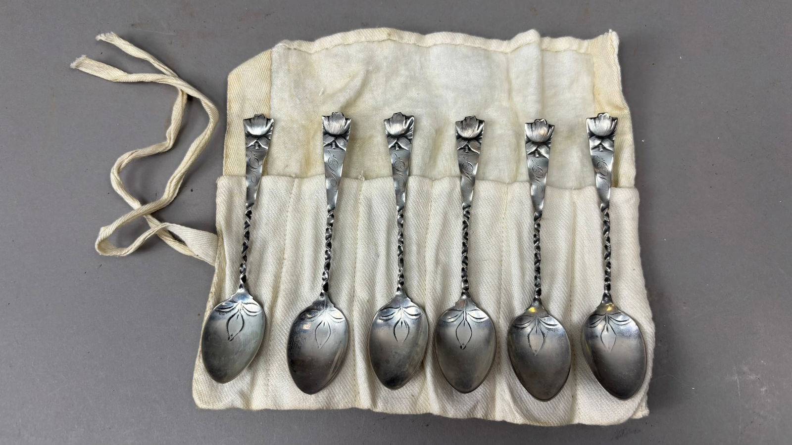 Six Gorham Sterling Silver Demitasse Spoons Floral Twist Handles 47 Grams: Set of six diminutive Gorham sterling silver demitasse spoons featuring an attractive floral motif with twisted stems and engraved terminals, each bearing the Gorham hallmark along with the stamp 15 a