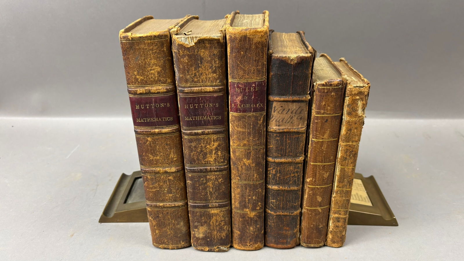 Collection of Six Early 19th Century Mathematics & Scientific Texts: Description: Collection of six early 19th century mathematics and scientific works bound in period leather, including two volumes of Charles Hutton’s A Course of Mathematics for the Use of Acade