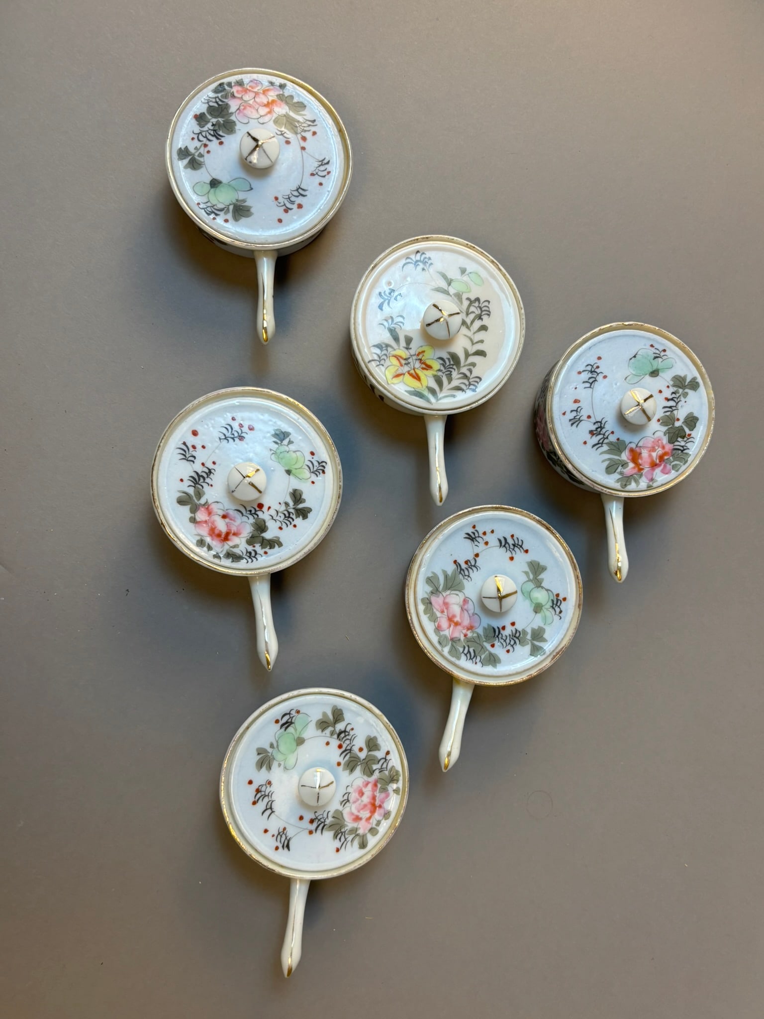 Chinese Export Porcelain Invalid Feeders Pap Bowls w Lids Set of 6: Set of six Chinese export porcelain invalid feeders or pap bowls with matching lids, decorated in soft famille-rose style floral enamels. Each vessel features a long feeding handle and vented lid with