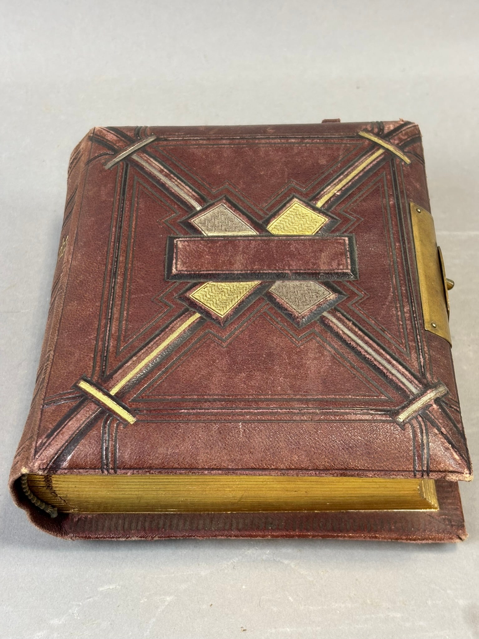 Victorian Leather CDV Photograph Album w 19th Century Portrait Photos: Victorian leather photograph album containing a collection of 19th century portrait photographs including albumen cartes de visite and later cabinet card format portraits depicting men, women, and chi