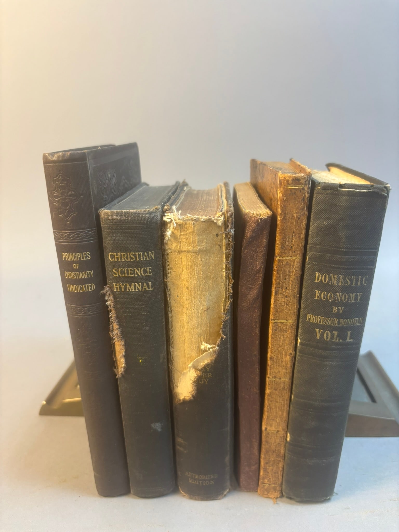Antique Religious Books Christian Science Hymnal Donovan Domestic Economy: Group of antique religious and theological books including The Principles of True Christianity Vindicated by William Grimshaw (London, 1846), Christian Science Hymnal with hymns by Mary Baker Eddy, Sc