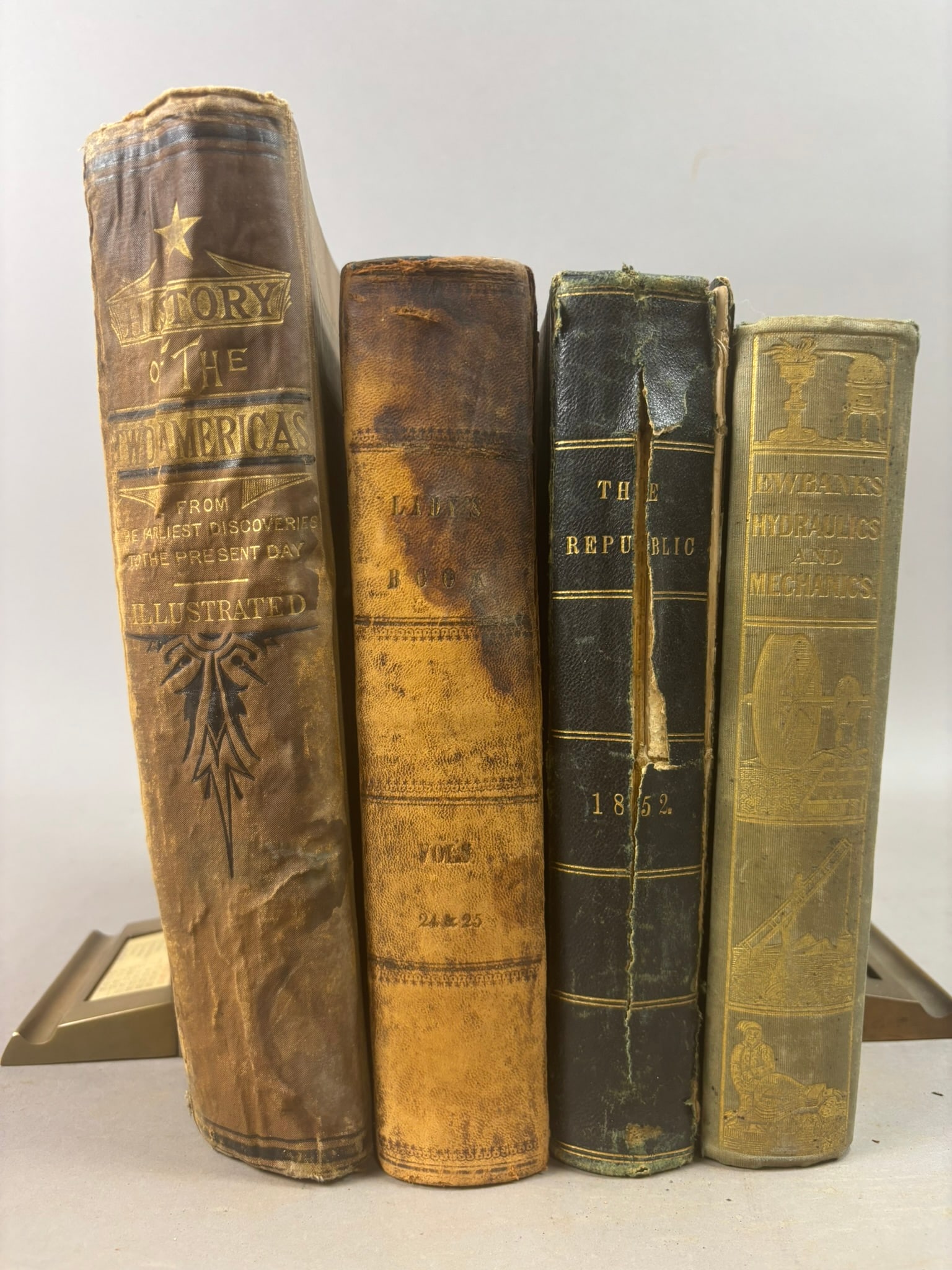 19thC Books History Two Americas Ewbab4323 Hydraulics Godeys Ladies Book Lot: Group of four 19th century books and bound volumes including The History of the Two Americas Complete published by Jay Andrews Decker & Co., Chicago, 1881, illustrated with engravings including a port