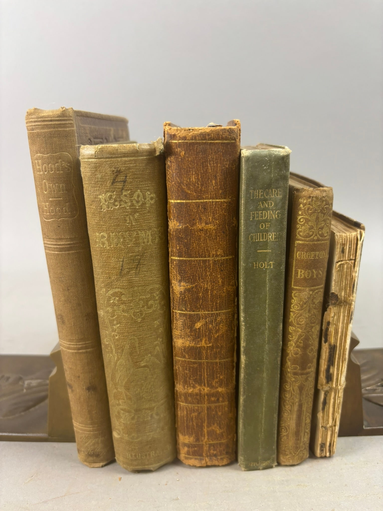 19thC Books Hood's Own Aesop In Rhyme British Classics Holt Children: Group of six books dating from the mid 19th to early 20th century including Hood’s Own: Selected Papers with Comic Illustrations published by Kiggins and Kellogg, New York, 1854; Aesop in Rhyme,