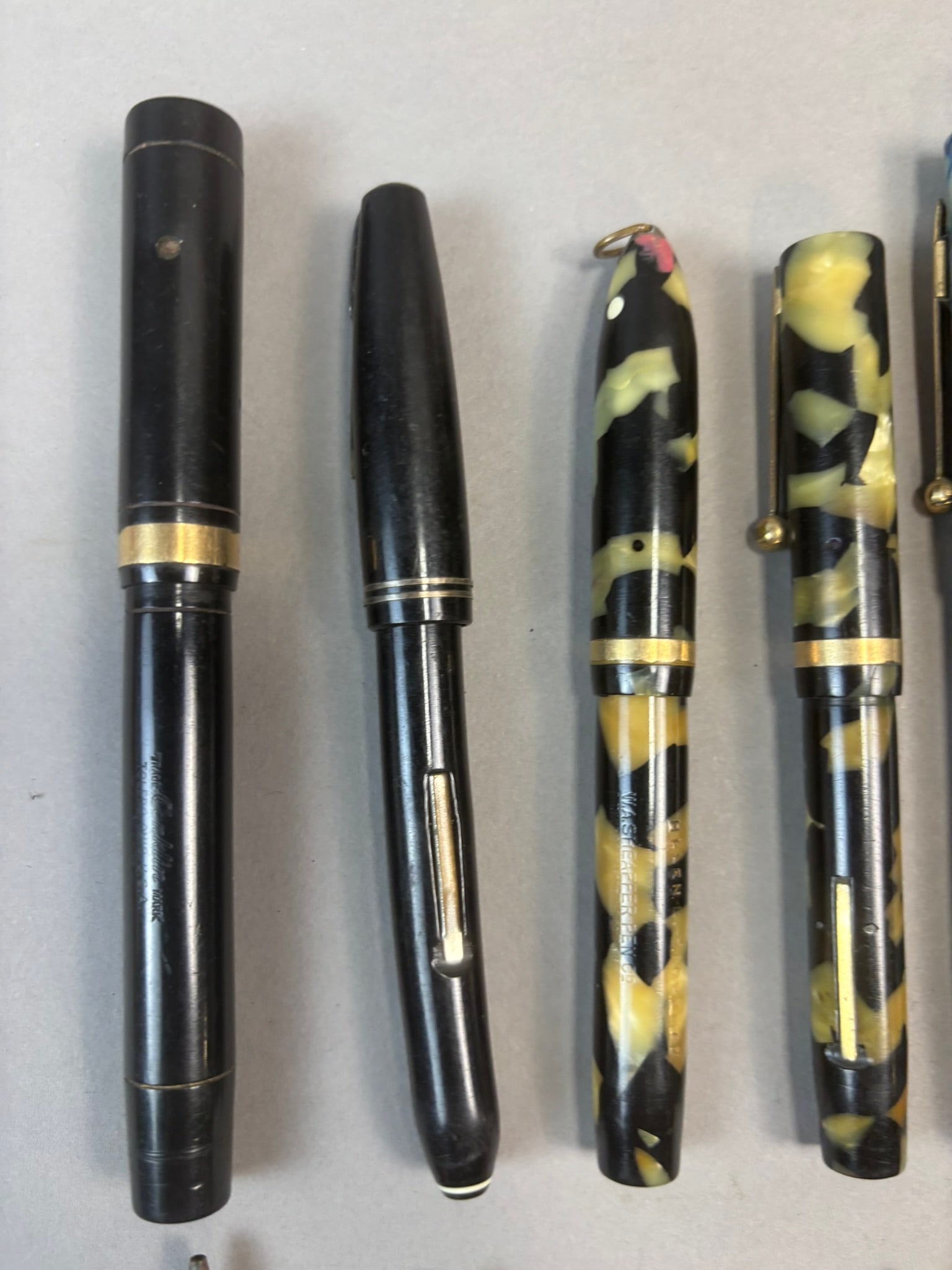Antique Fountain Pens Celluloid Marble Lever Fill Writing Pens Lot 13: Group of thirteen vintage fountain pens dating primarily to the early to mid 20th century including several marbled and mottled celluloid examples in black, yellow, blue, and green patterns along with