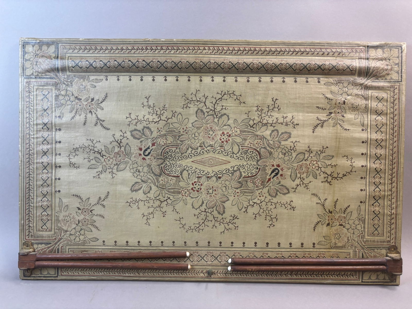 Antique Kitchen Towel Drying Rack Hand Painted Canvas Patent 1878: Antique wall mounted kitchen towel drying rack featuring a decorative hand painted canvas panel with floral and bird motif and extending wooden drying rods. Designed for mounting behind or above a kit