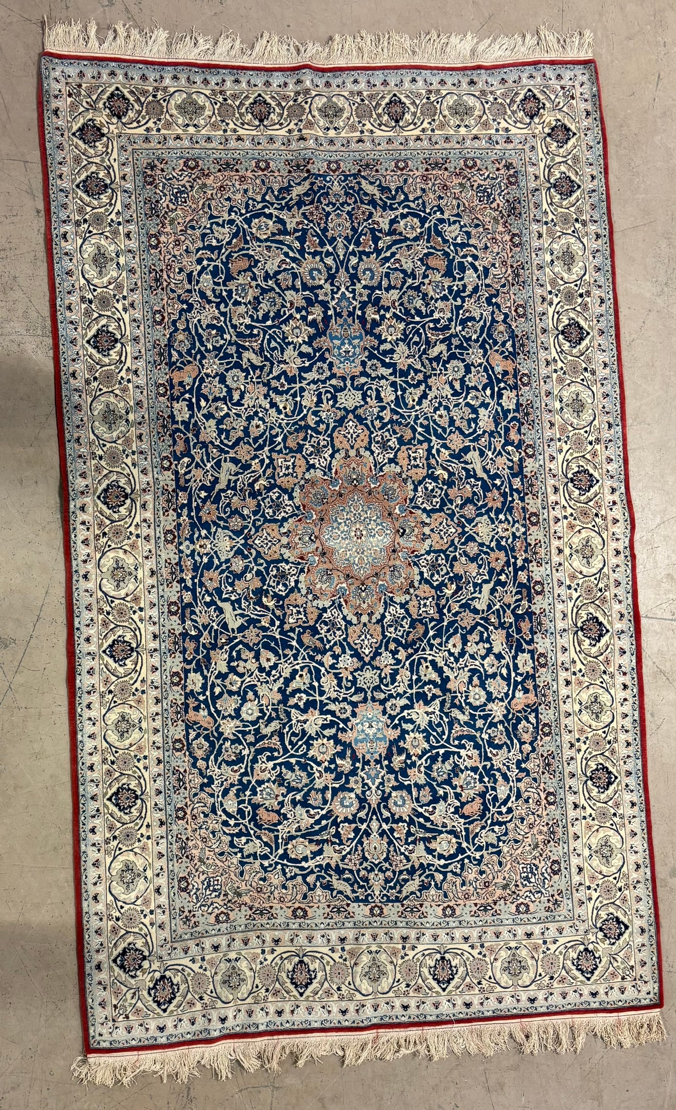 Hand Woven Iranian Wool Rug Hunting Scene Animals Medallion 8.7x5.3 Carpet: Hand woven Iranian wool rug featuring a richly detailed hunting scene field with animals, birds, and scrolling floral vines surrounding a central medallion on a deep navy ground. The composition is fr