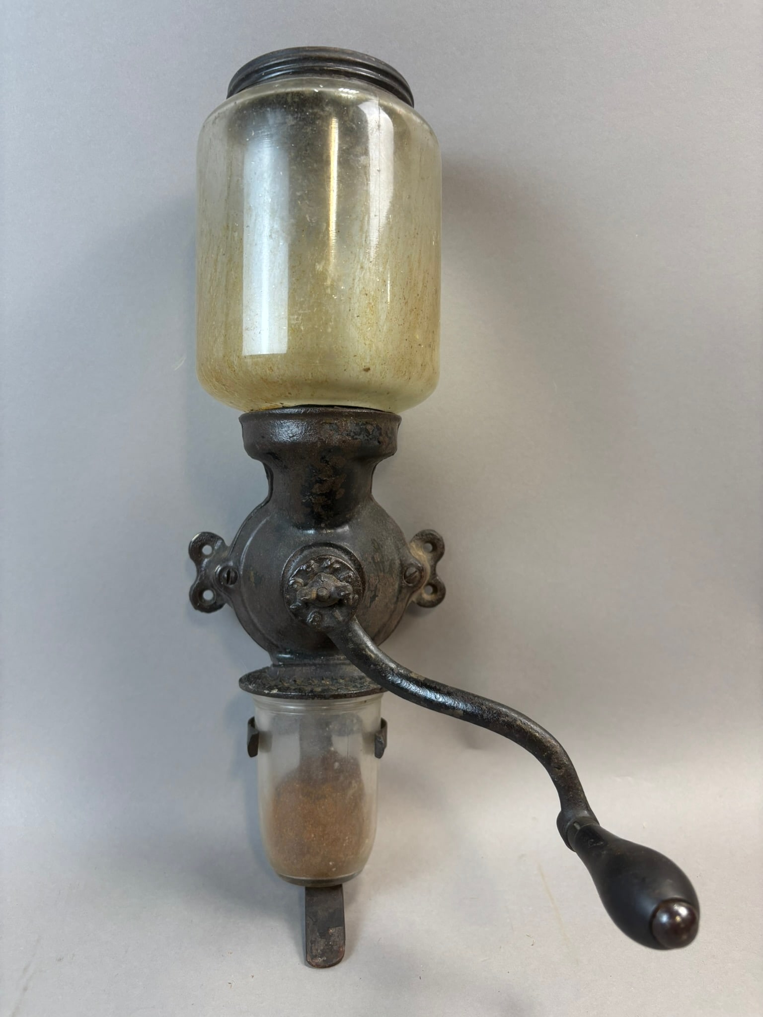 Antique Arcade Crystal No 3 Wall Mount Coffee Grinder Mill: Antique wall mounted coffee grinder manufactured by the Arcade Manufacturing Company of Freeport, Illinois, marked “Arcade Crystal No. 3.” The grinder features a cast iron body with hand c