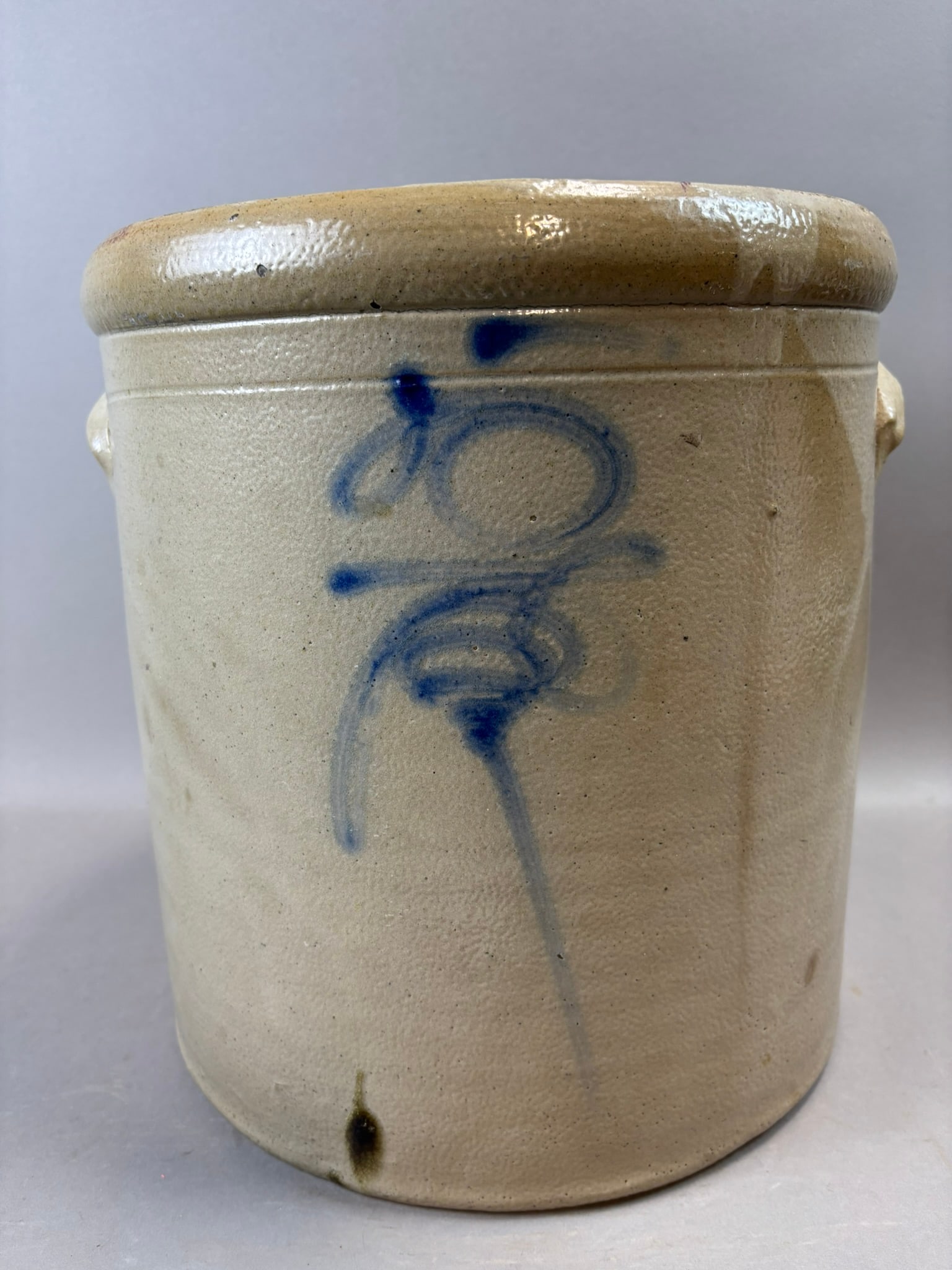 Antique 5 Gallon Cobalt Decorated Stoneware Crock Salt Glaze 12.5": 19th century salt-glazed stoneware crock featuring a freehand cobalt spiral and foliate decoration in soft blue tones. The simple yet expressive brushwork stands out against the warm buff stoneware bo