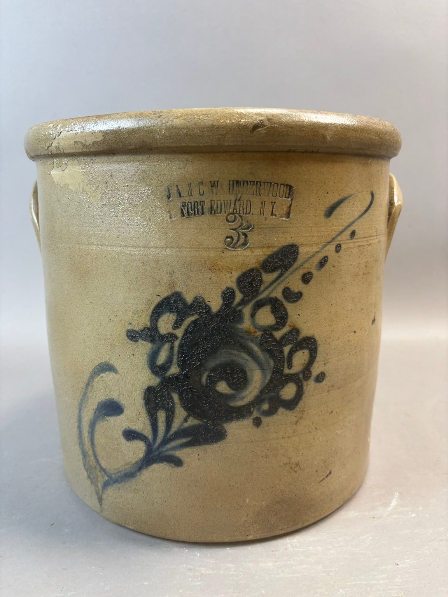 Rare Cobalt J A & C W Underwood Fort Edward NY Stoneware 3 Gallon Crock: Antique American stoneware crock stamped “J.A. & C.W. Underwood Fort Edward, N.Y.” featuring bold hand-painted cobalt floral decoration with impressed “3” gallon capacity mark