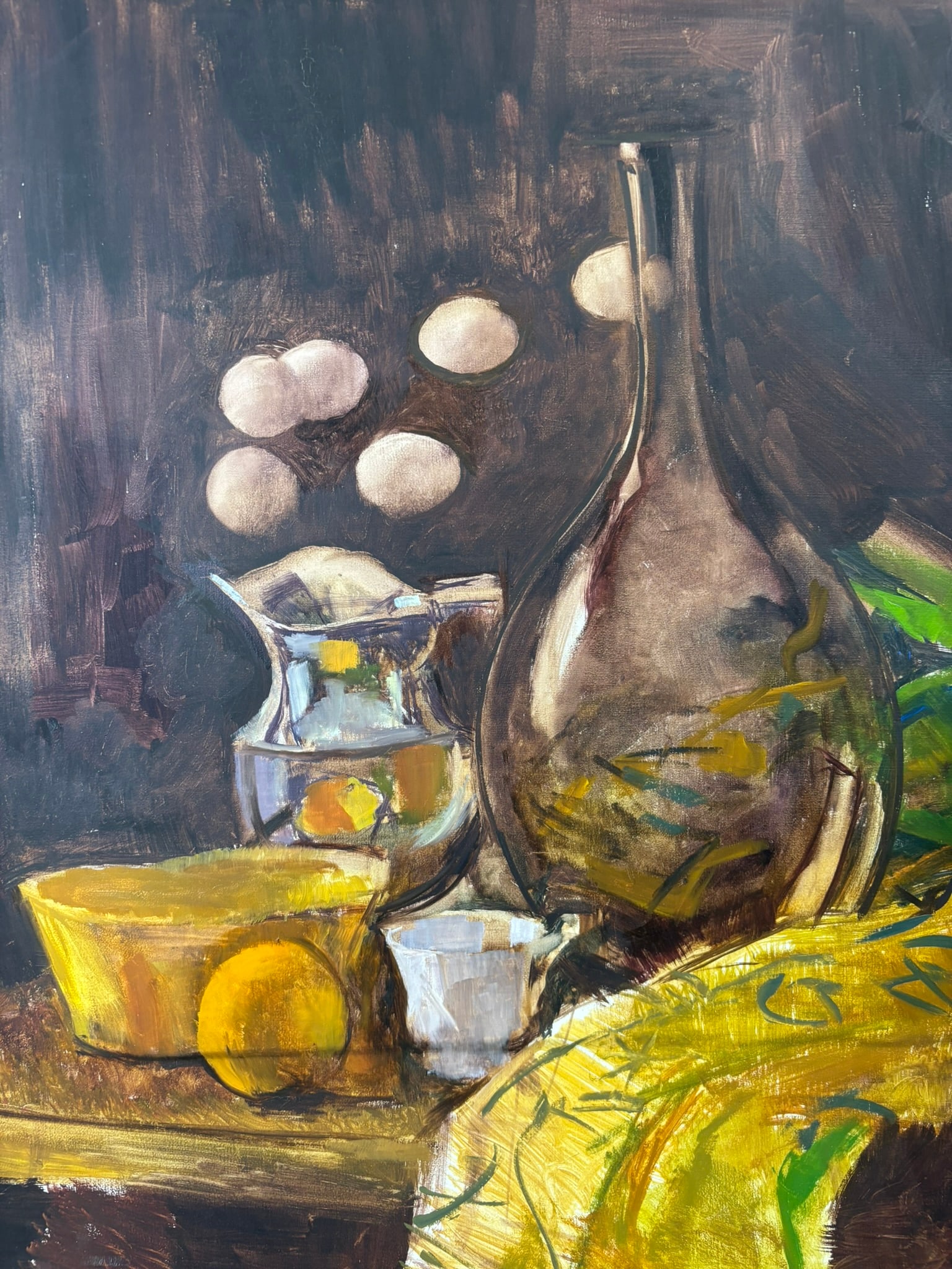 Henry Schafer Still Life Eggs Glass Pitcher Lemon Oil Painting: Original oil on canvas still life by Jackson, Michigan artist Henry Schafer featuring a tabletop arrangement of eggs, a glass pitcher, a small cup, and a bright lemon beside a draped yellow cloth. The