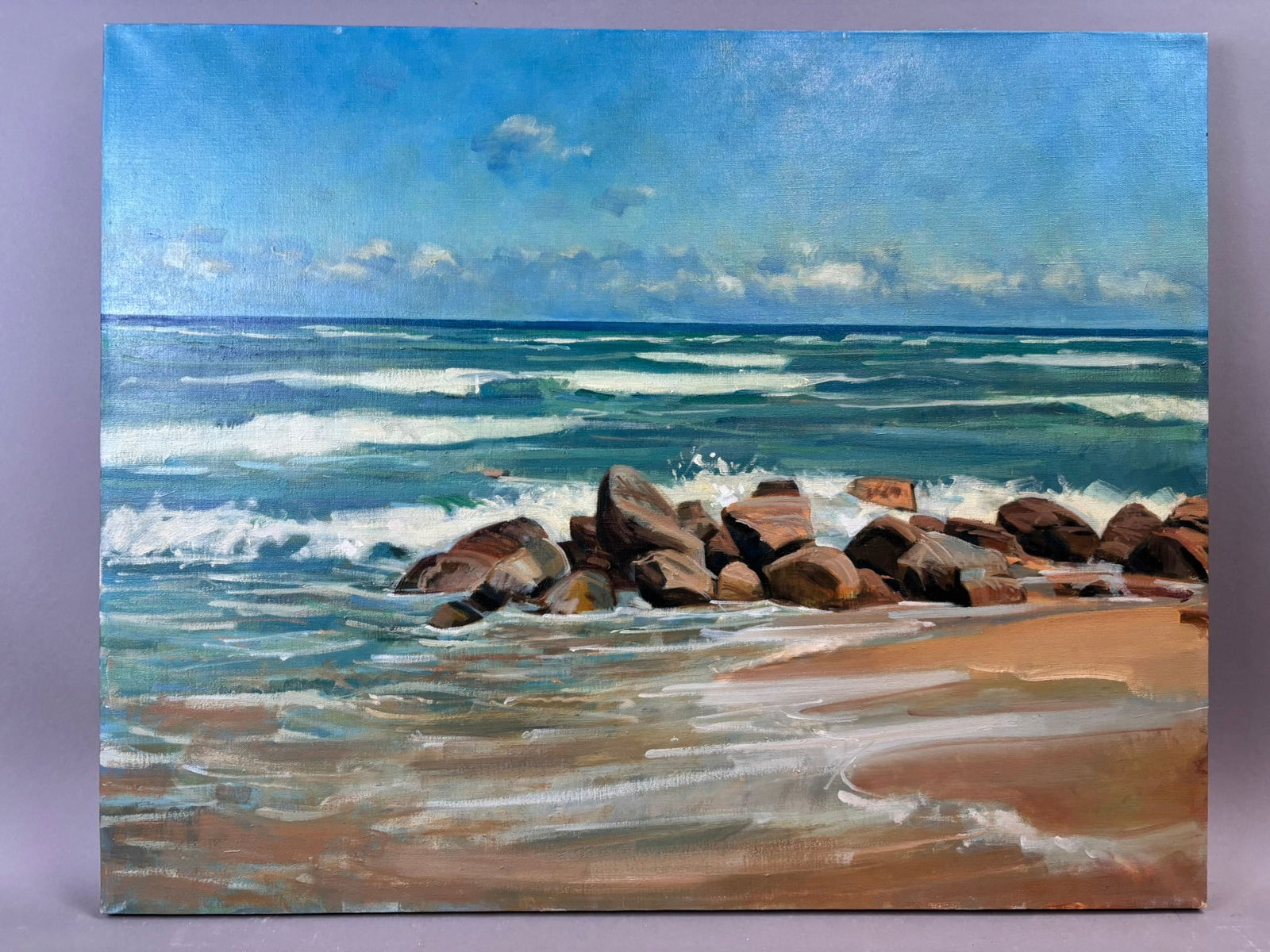 Henry Schafer Seascape Oil Painting Waves Crashing Rocks Shoreline 30x24: Original oil on canvas seascape by Jackson, Michigan artist Henry Schafer depicting rolling waves breaking against a rocky shoreline with sandy beach in the foreground and a bright blue sky along the