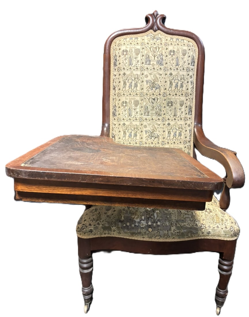 19th Century Walnut Writing Chair Desk Hidden Compartments Drawers: Extremely unusual and highly functional 19th century walnut writing chair featuring an integrated swivel writing surface and concealed storage. The chair retains its original figural tapestry upholste
