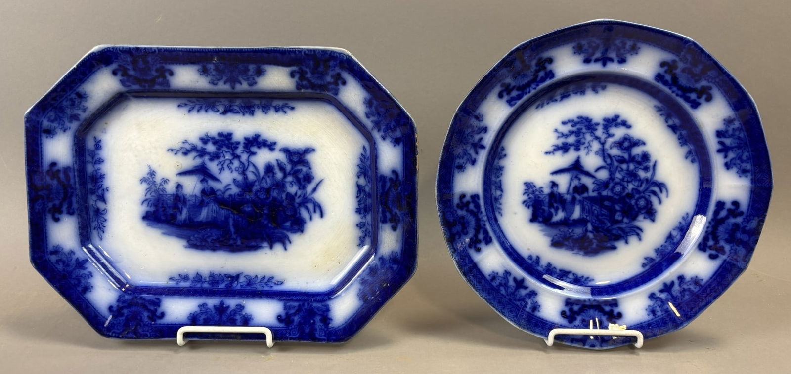 Flow Blue Amoy Pattern Octagonal Platter & Plate Set 19th Century Pair: Pair of 19th century flow blue transferware serving pieces in the desirable Amoy pattern, including an octagonal platter measuring approximately 12.25 x 9.5 inches and a matching octagonal plate measu