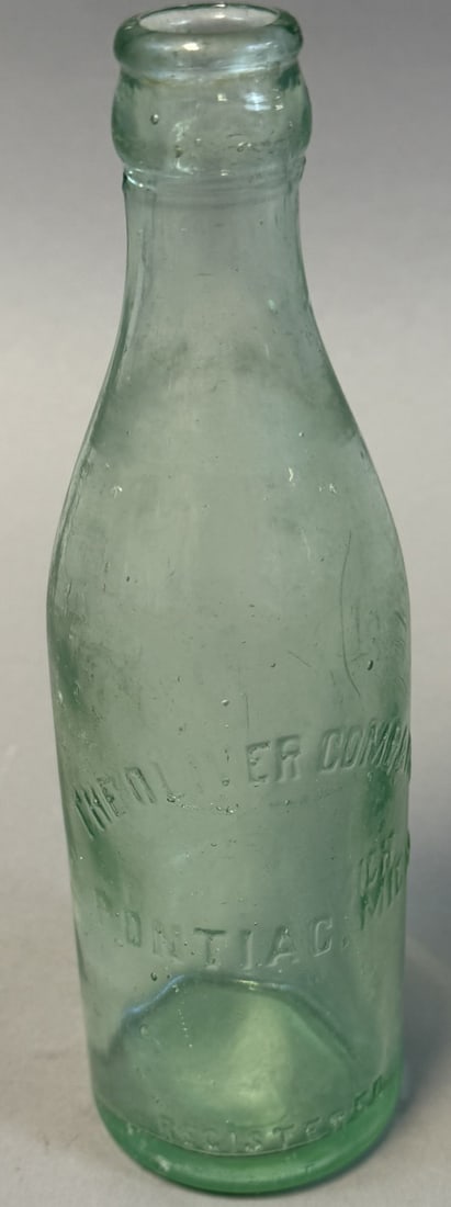 The Oliver Company Pontiac Michigan Coca Cola Straight Side Bottle Pre 1915: Early Coca-Cola straight side green glass bottle embossed ?The Oliver Company? and ?Pontiac, Mich,? representing a local Michigan bottler example dating to the pre-1915 era before the contour bottle i