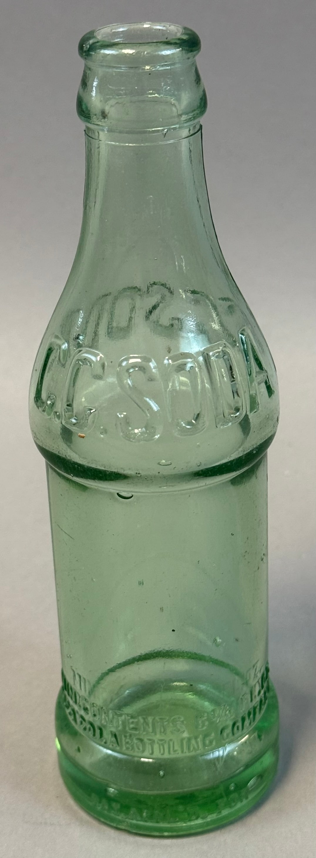 Quincy FL Straight Side Coca Cola Bottle Aqua Glass Early Coke Soda: Early straight-sided Coca-Cola bottle embossed Coca-Cola script with ?Min. Contents 6? Fl. Oz.? and marked for Quincy, Florida Coca-Cola Bottling Company, dating to circa 1910?1920 pre-contour era, aq