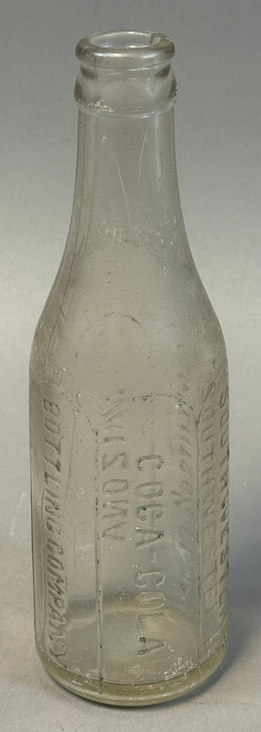 Antique Coca Cola Straight Sided Bottle Arizona 6.5oz Embossed: Early 20th century Coca-Cola straight-sided bottle embossed Coca-Cola Bottling Co with Arizona designation and CONTENTS 6? FL OZ marking; features classic vertical panel form with crown top lip; notab