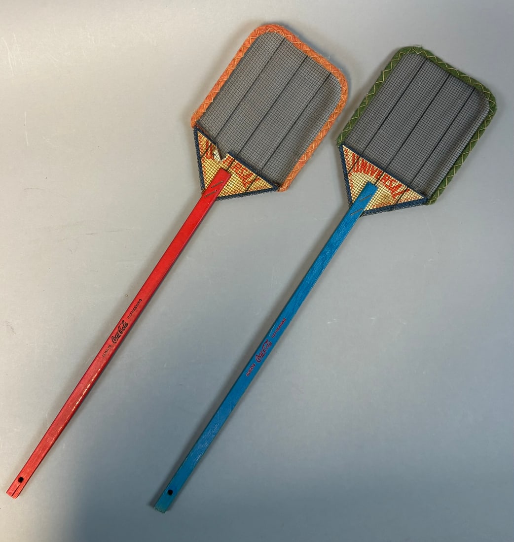 Pair Coca-Cola Advertising Fly Swatters Wood Handle Mesh Vintage: Vintage pair of Coca-Cola advertising fly swatters featuring painted wooden handles in red and blue with ?Always Coca-Cola Refreshing? script, attached to wire mesh heads with stitched cloth trim in c