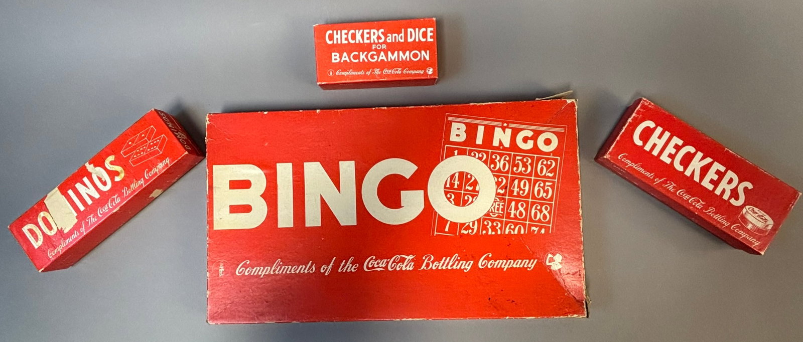 Coca-Cola Bingo Game w Chips Cards + Checkers Dice Backgammon Sets Lot: Vintage Coca-Cola promotional game lot including a complete Bingo set with original cardboard box, numerous wooden number chips with red printed numerals, Bingo cards, and printed rules sheet, accompa