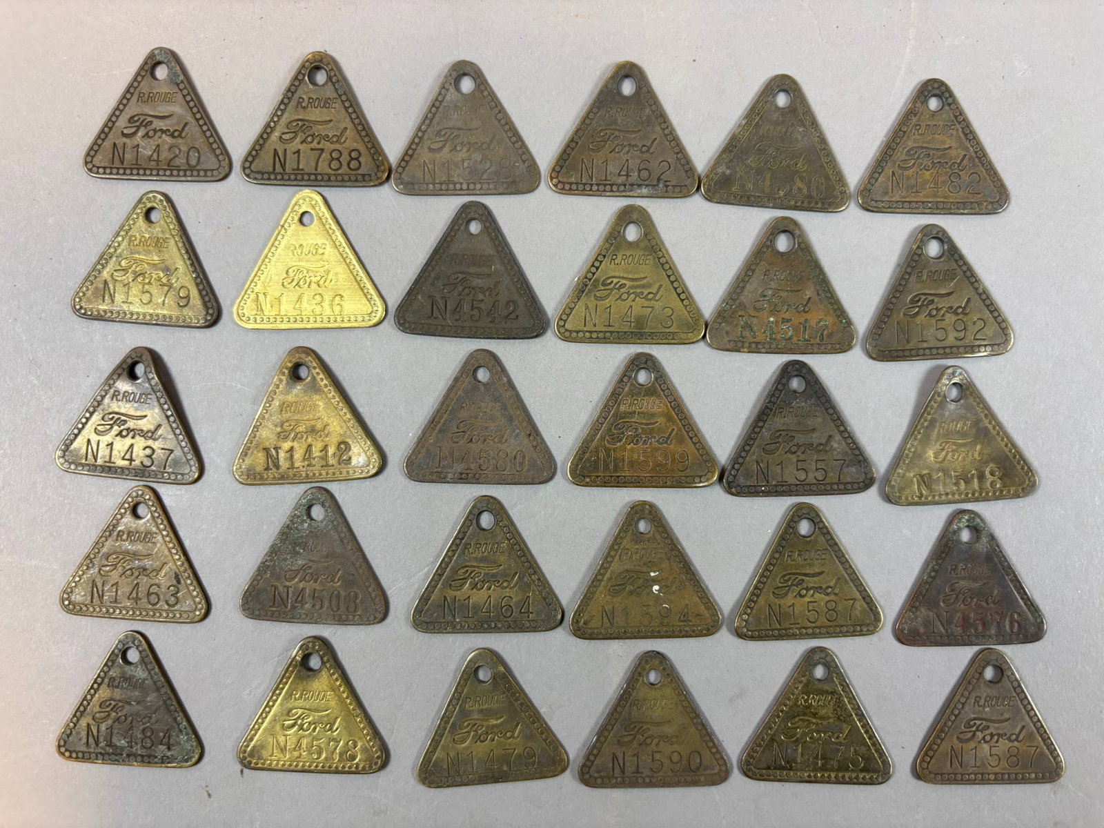 Lot 30 Ford Motor Co Rouge River Brass Tool Check Triangular Key Tags: 1.25" x 1.25"