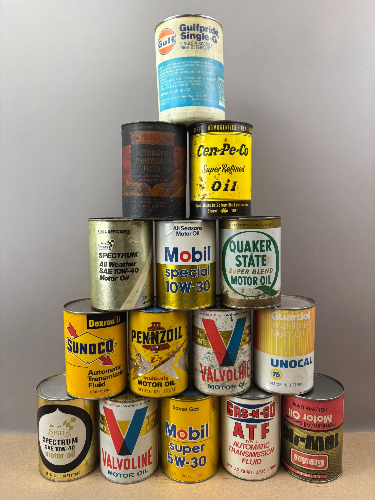 Lot 15 Empty Gulf Cen-Pe-Co Mobil Sears Gas-N-Go Composite Oil Can: All empty.