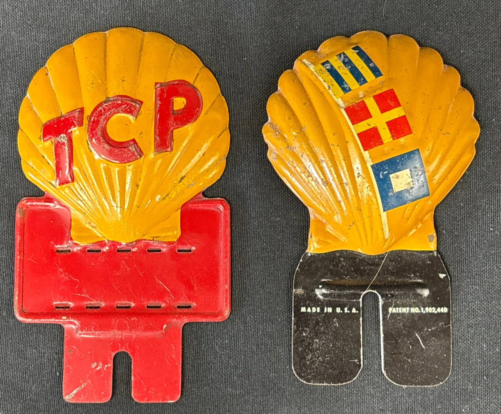 Pair Shell TCP 30s Embossed Gas Station License Plate Toppers: Great original graphics. Wear as shown. See all photos for a better idea on condition.